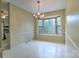 Bright breakfast nook featuring a bay window and decorative wallpaper at 1658 Buckingham Ave, Gastonia, NC 28054