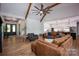 Inviting living space with hardwood floors, open floor plan, and easy access to kitchen at 176 Windwood Ln, Troutman, NC 28166