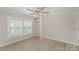 Spacious bedroom with a ceiling fan, fresh paint, a closet and modern flooring at 210 Marshall St, Rock Hill, SC 29730
