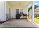 Relaxing back patio, perfect for outdoor dining or lounging in a private setting at 219 Mccord St, Charlotte, NC 28216