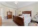 Bright bedroom featuring a ceiling fan and a comfortable bed, offering a cozy retreat at 219 Mccord St, Charlotte, NC 28216