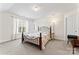 Roomy bedroom with a large window, carpet floors, and modern fixtures at 219 Mccord St, Charlotte, NC 28216