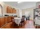 Combined kitchen and dining area featuring lots of light and wood floors at 219 Mccord St, Charlotte, NC 28216