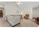 Cozy living room with plush sofa, recliner, and neutral tones, creating a relaxing atmosphere at 219 Mccord St, Charlotte, NC 28216