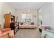 Inviting living room with decorative chandelier, comfortable seating, and bright natural light at 219 Mccord St, Charlotte, NC 28216