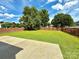 Large backyard with a well-maintained lawn and wooden fence at 2242 Shumard Cir, Indian Trail, NC 28079