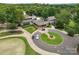 Community clubhouse and entrance with a well-manicured landscape and fountain feature at 23 Tanglewood Rd, Clover, SC 29710