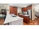 Modern kitchen with a large island, white countertops, stainless steel appliances, and custom cabinetry at 23 Tanglewood Rd, Clover, SC 29710