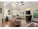Spacious living room with high ceilings, a fireplace, and abundant natural light at 23 Tanglewood Rd, Clover, SC 29710