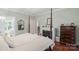 Relaxing main bedroom features a bed, fireplace, windows, and a neutral color palette at 23 Tanglewood Rd, Clover, SC 29710