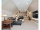 Large bonus room with a comfortable seating area, a ceiling fan, and a mounted television at 237 Garvin Rd, McConnells, SC 29726