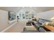 Spacious living room with a large leather sofa and custom built-in shelving at 237 Garvin Rd, McConnells, SC 29726