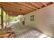 View of under house with wood supports and a peek at the spacious backyard at 25056 Timberlake Dr, Fort Mill, SC 29708