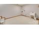 Large laundry room with a utility sink, neutral walls, and wood trim at 25056 Timberlake Dr, Fort Mill, SC 29708