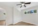 Bright bedroom with a ceiling fan, neutral walls, closet and a window offering views of outside at 2600 Alleghany St # 10, Charlotte, NC 28208