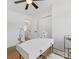 Bright bedroom offers ample lighting, wood-look flooring, and closet at 2600 Alleghany St # 10, Charlotte, NC 28208