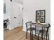 Cozy breakfast nook featuring a round table, modern chairs and decor, creating a warm and inviting dining space at 2600 Alleghany St # 10, Charlotte, NC 28208