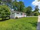 Charming home with fresh green lawn and red front door at 2600 Alleghany St # 10, Charlotte, NC 28208