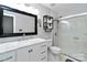 Bright bathroom features a glass shower, modern fixtures, white marble vanity, and contemporary mirror at 3092 Hitching Post Ln, Rock Hill, SC 29732