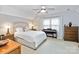 Comfortable bedroom featuring a bright window, ceiling fan, and piano by the wall at 3092 Hitching Post Ln, Rock Hill, SC 29732