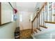 Foyer with a coat rack, a staircase, and decorative accents at 3092 Hitching Post Ln, Rock Hill, SC 29732