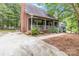 Covered front porch featuring classic columns and stylish design details at 3092 Hitching Post Ln, Rock Hill, SC 29732