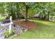 Manicured front yard featuring a mailbox and lush landscaping leading to the home at 3092 Hitching Post Ln, Rock Hill, SC 29732