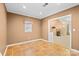 Sun room with tiled floor, neutral paint, and lots of natural light coming in through windows at 322 Cottonwood Park Dr, Charlotte, NC 28214