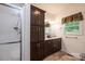 Bathroom featuring a shower with glass door, a double vanity with a dark wood cabinet at 3659 Vashti Rd, Taylorsville, NC 28681