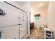 Bathroom featuring a stand-up shower with glass door, a toilet, and vanity at 3659 Vashti Rd, Taylorsville, NC 28681