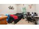 Bedroom with a black bed, gaming desk and chair, and light from window at 3659 Vashti Rd, Taylorsville, NC 28681