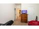 Bedroom features neutral tones with a dresser and view into other rooms at 3659 Vashti Rd, Taylorsville, NC 28681