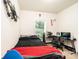 The bedroom has a bed, desk, and a window overlooking the backyard at 3659 Vashti Rd, Taylorsville, NC 28681