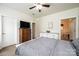 Bedroom with neutral colors, ceiling fan, and furniture, creating a serene atmosphere at 3659 Vashti Rd, Taylorsville, NC 28681