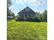 Charming home featuring a covered front porch and a well-manicured lawn at 3659 Vashti Rd, Taylorsville, NC 28681
