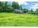 Charming single-Gathering home on a sprawling green lawn with trees in background at 3659 Vashti Rd, Taylorsville, NC 28681