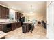 Open concept kitchen features a central island, black appliances, and breakfast bar seating at 3659 Vashti Rd, Taylorsville, NC 28681