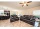 Open floor plan features living room and kitchen area with large sofas and natural light at 3659 Vashti Rd, Taylorsville, NC 28681