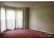 Cozy bedroom with multiple windows and soft natural lighting at 3664 Gaston Day School Rd, Gastonia, NC 28056