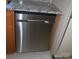 Stainless steel dishwasher with wooden cabinets and granite countertops at 3664 Gaston Day School Rd, Gastonia, NC 28056