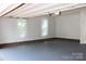 Clean and spacious two-car garage interior with painted floor and plenty of natural light at 3664 Gaston Day School Rd, Gastonia, NC 28056