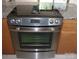 Stainless steel oven with granite countertops and wooden cabinets at 3664 Gaston Day School Rd, Gastonia, NC 28056