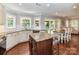 Bright kitchen with stainless steel appliances, center island, and hardwood flooring at 3905 Brittany Ct, Indian Trail, NC 28079