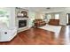 Bright living room with a stone fireplace, hardwood floors and comfortable furnishings at 3905 Brittany Ct, Indian Trail, NC 28079