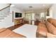 Open living room with hardwood floors, fireplace, and access to the backyard at 3905 Brittany Ct, Indian Trail, NC 28079