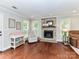 Cozy living area with stone fireplace, recessed lights, and ample natural light at 3905 Brittany Ct, Indian Trail, NC 28079