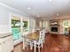 Open eat-in kitchen to living room concept with hardwood floors and lots of light at 3905 Brittany Ct, Indian Trail, NC 28079