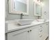 Bathroom featuring double vanity, white cabinets, grey countertop, and modern fixtures at 43 Paddington Sw Dr, Concord, NC 28025
