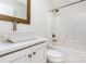 Bathroom featuring vanity, white cabinets, gray countertop, and bathtub at 43 Paddington Sw Dr, Concord, NC 28025