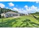 An expansive backyard featuring a lush green lawn and a subtle slope, perfect for outdoor activities at 4420 Bright Rd, Charlotte, NC 28214